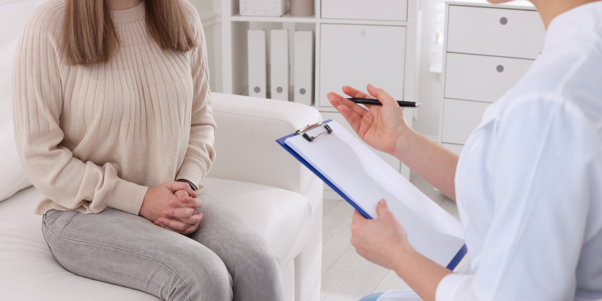 woman looking at pregnancy test