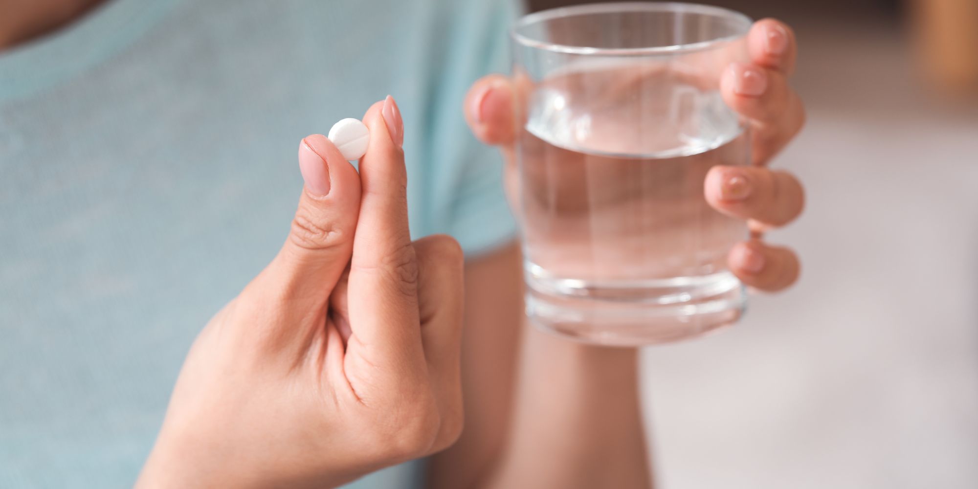 woman looking at pregnancy test