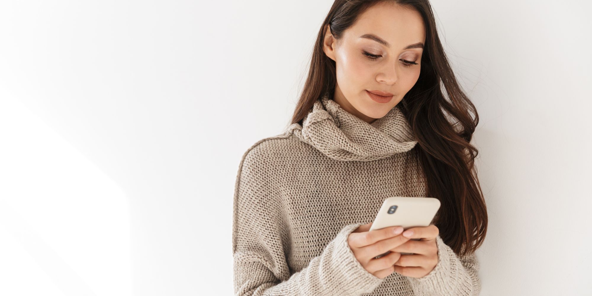 woman looking at pregnancy test