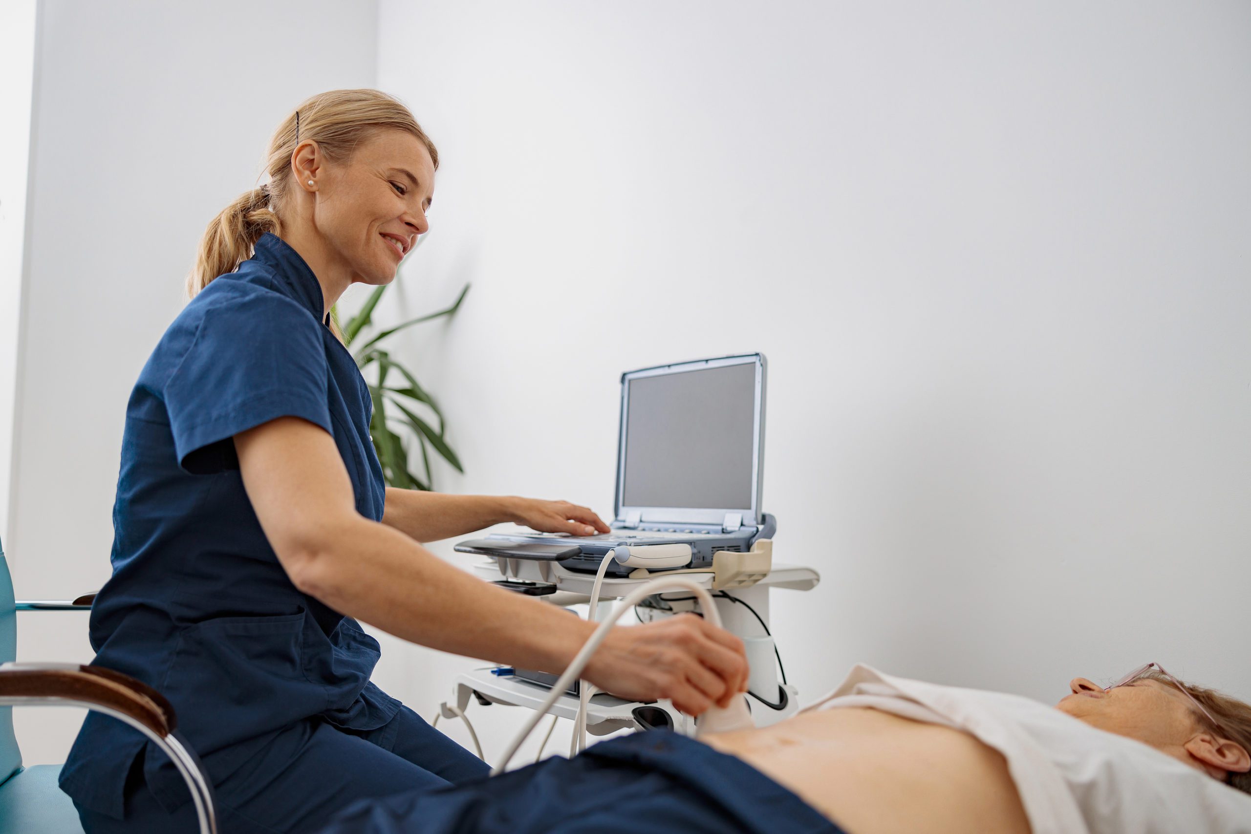 bigstock-Doctor-Ultrasound-Examine-Seni-456397199-2-scaled (3)