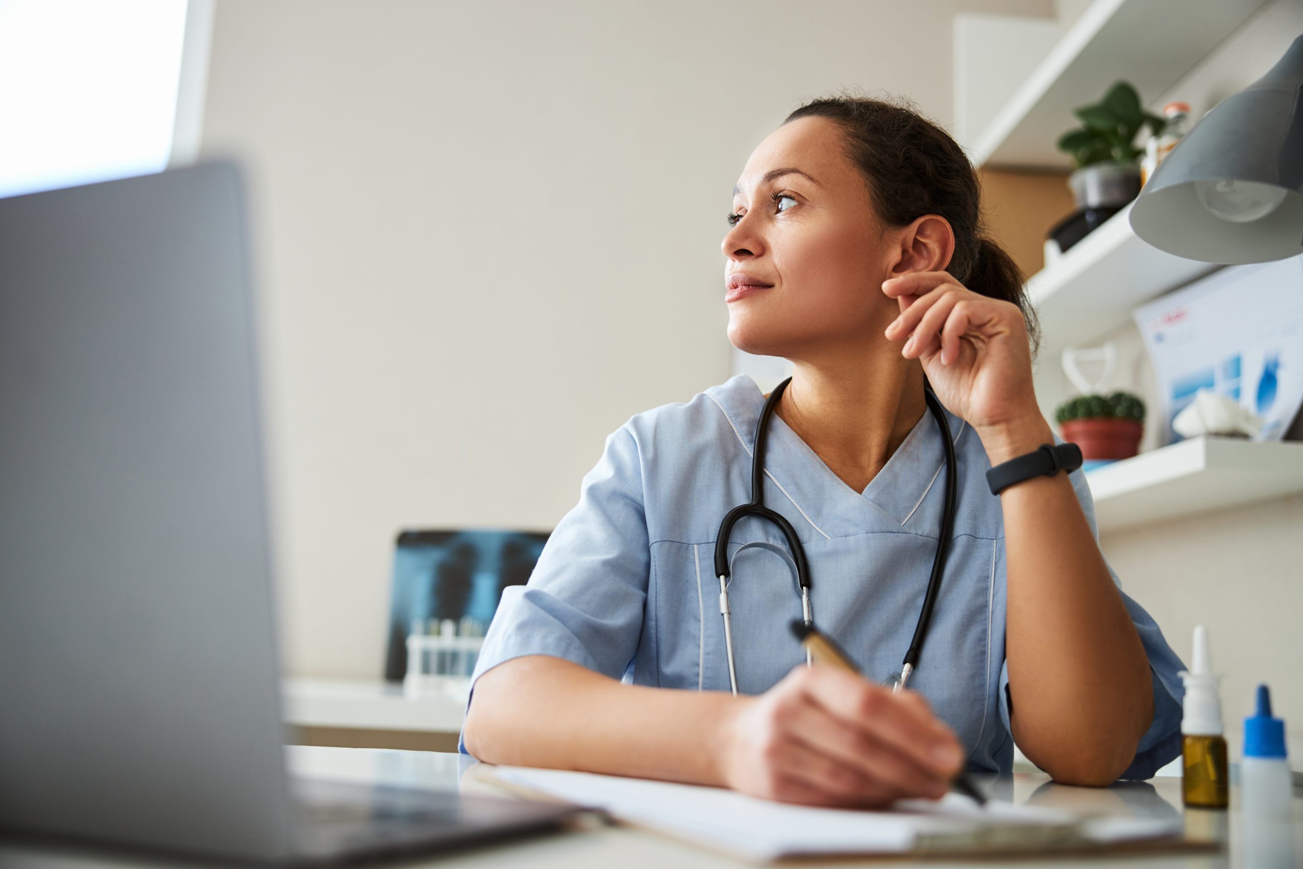 bigstock-Dreaming-Medic-Rubbing-Her-Ear-404177432-scaled (3)